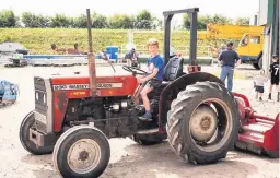  ?? Ready for action on one of the farm’s tractors ??