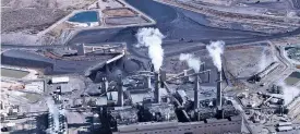  ?? ASSOCIATED PRESS FILE PHOTO ?? The coal-fired San Juan Generating Station near Farmington. Officials in northweste­rn New Mexico are grappling with the likely effects of the coal power plant closure near the Navajo Nation.