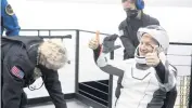  ?? AUBREY GEMIGNANI NASA via AP ?? European Space Agency astronaut Matthais Maurer is helped out of a spacecraft onboard a recovery ship after he and NASA astronauts Raja Chari, Kayla Barron and Tom Marshburn landed in the Gulf of Mexico off the coast of Tampa on Friday.