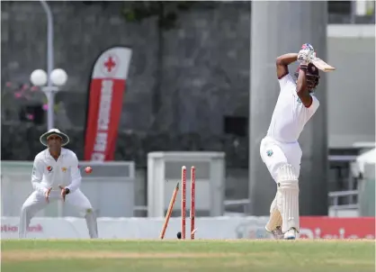  ??  ?? ROSEAU: West Indies batsman Shimron Hetmyer is clean bowled by Mohammad Amir of Pakistan for 25 runs on the fifth day’s play of the final test match at the Windsor Park Stadium. — AFP