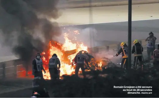  ?? PHOTO AFP ?? Romain Grosjean a été secouru au bout de 28 secondes dimanche.