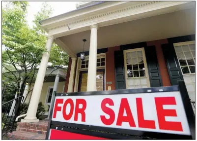  ?? AP/STEVE HELBER ?? This week’s low 30-year mortgage rate is an encouragin­g sign for would-be homebuyers, but sales are being hampered by a dearth of starter homes like this one Thursday in Richmond, Va.