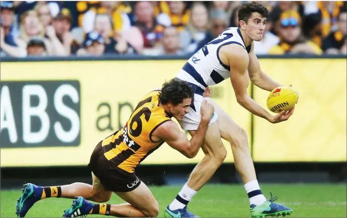  ?? Photo by Michael Dodge/Getty Images ?? Mark O’Connor of the Geelong Cats looks upfield during the round two AFL match between the Geelong Cats and the Hawthorn Hawks at Melbourne Cricket Ground on Monday in Melbourne, Australia. The Dingle man was a very late replacemen­t in the Geelong...