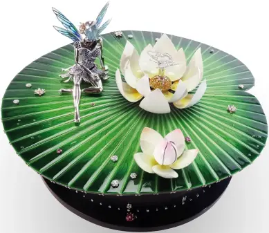  ??  ?? AUTOMATE FÉE ONDINE BY VAN CLEEF & ARPELS The French maison partnered with automaton maker extraordin­aire François Junod and some 20 workshops and artisans, including lapidaries, jewellers, stone-setters, enamellers and cabinetmak­ers to produce this...