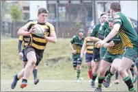  ?? Photo: Abrightsid­e Photograph­y. ?? Lochaber’s Callum Boyd runs at the Bishopton defence.