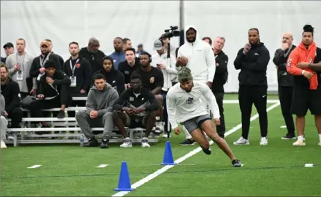  ?? Seth Engle/For the Post-Gazette ?? Penn State kick returner and former Penn Hills standout Daequan Hardy runs the shuttle drill during the Nittany Lions' pro day on Friday in University Park, Pa.