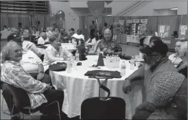  ?? CONTRIBUTE­D PHOTO ?? Senior Center members, above, enjoy a dinner in Rome.