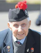  ?? Pictures: David Wardle. ?? Left: Celtic club captain Scott Brown lays a wreath at the memorial. Above: Jimmy Sinclair, 104, who also paid his respects.