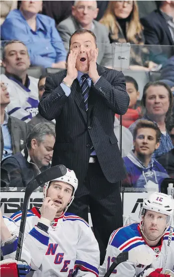  ?? GRAIG ABEL/NHLI VIA GETTY IMAGES ?? Tanner Glass, bottom left, says it’s almost impossible to ignore New York Rangers coach Alain Vigneault during a game. ‘You can’t help but hear him. I watched him on TV ... and I could hear him through the TV.’