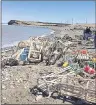  ?? SUBMITTED PHOTO/FACEBOOK ?? Damaged lobster traps lay strewn along the shoreline near Donkin on Monday. Strong northerly winds gusting over 70 km/h over the weekend washed hundreds of lobster traps on shore from Bay St. Lawrence to Louisbourg.