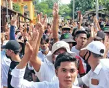  ??  ?? People attend a protest against Myanmar’s military coup in Launglon, Myanmar on Friday