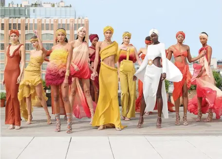  ?? GETTy ImAgES ?? ALL TOGETHER NOW: Models pose for the Bronx & Banco presentati­on during New York Fashion Week on Tuesday in New York.