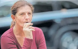  ?? /Reuters ?? Ready market: A woman smokes a Juul e-cigarette in New York. The company faces regulatory scrutiny in the US and Israel over the potential health risks of its products.