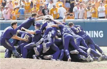  ?? AP ?? Notre Dame players celebrate after defeating Tennessee in NCAA super regional game Sunday in Knoxville.