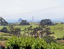  ?? SIMON O’CONNOR/STUFF ?? New Plymouth’s power station chimney and Paritutu rock are in view from the property.