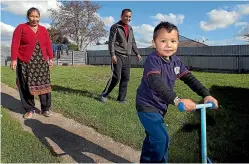  ?? MURRAY WILSON/STUFF ?? A Bhutanese family settled in Palmerston North in 2015 as part of the refugee quota programme.