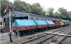  ?? ?? The china clay hood train behind Class 50 No. 50042 Triumph at Bodmin General. BWR