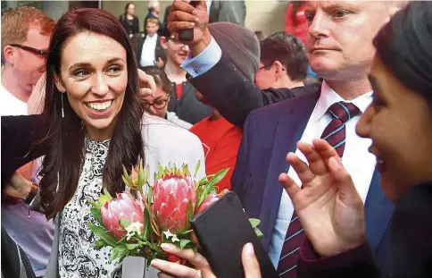  ??  ?? Ardern’s rise to power draws parallel with young leaders such as Emmanuel Macron in France and Justin Trudeau in Canada. — AFP