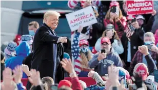  ?? ELISE AMENDOLA THE ASSOCIATED PRESS ?? U.S. President Donald Trump greets supporters as he leaves a campaign rally in Londonderr­y, N.H. on Sunday. Some Canadians living in the U.S. have contingenc­y plans should Trump win again.