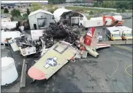  ?? / Associated Press ?? This photo, provided by the National Transporta­tion Safety Board, shows damage from a World War II-era B-17 bomber plane that crashed on Oct. 2, 2019, at Bradley Internatio­nal Airport in Windsor Locks.