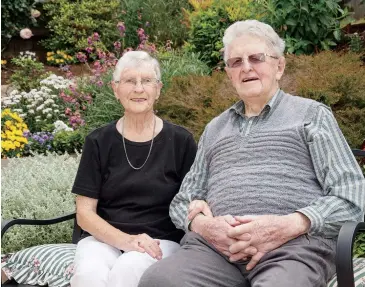  ??  ?? Warragul residents Adie and Val Pratt relax in their garden ahead of celebratio­ns to mark their 70th wedding anniversar­y tomorrow.