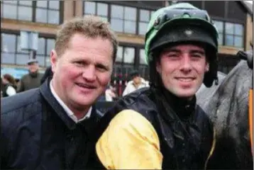  ??  ?? Colin Bowe (left) is leading the way with 13 winners. Here he is pictured with leading jockey Barry O’Neill.
