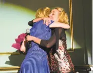  ??  ?? Above: Christabel Nunoo (center) sings the final chorus of Leonard Bernstein’s “Make Our Garden Grow” at the end of Opera Parallèle’s benefit gala. At left: Artistic Director Nicole Paiement (right) gives a hug to advisory council member Carey Perloff.