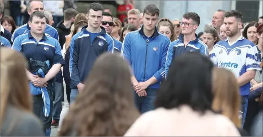  ??  ?? Representa­tives of local GAA club Lannleire GFC form a guard of honour.