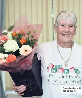  ??  ?? Gwen Davies with her bouquet