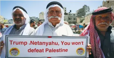  ?? (Abed Rahim Khatib/Flash90) ?? RESIDENTS OF Khan Yunis, in the southern Gaza Strip, protest yesterday against Israel’s plan to annex parts of the West Bank.