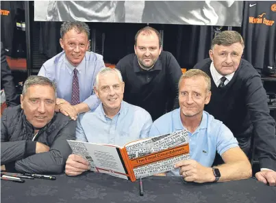  ?? Pictures: Gareth Jennings. ?? Looking over the new book at the club shop are, from left, back, John Holt, Richard Rooney and Paul Hegarty; front: Jim McInally, Dave Narey and Dave Bowman.