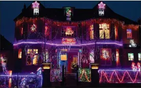  ??  ?? SWITCHED ON: This Wimbledon home has been lit up since October