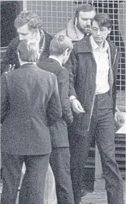  ??  ?? Nilsen, right, leaving Highgate Magistrate­s’ Court in 1983.