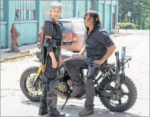  ?? AP PHOTO ?? This image released by AMC shows Melissa McBride as Carol Peletier, left, and Norman Reedus as Daryl Dixon in a scene from “The Walking Dead.” The eighth season premieres on Oct. 22.