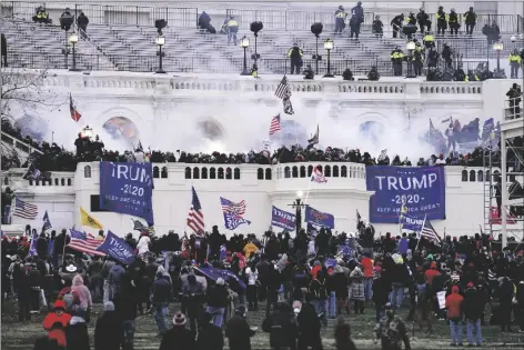  ?? ASOCIATED PRESS ?? IN THIS JAN. 6 FILE PHOTO, violent protesters storm the Capitol in Washington.