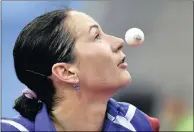  ?? PICTURE: EPA ?? Polina Mikhailova of Russia gets her nose close to the ball against Mercedes Nagyvaradi of Hungary during their women’s singles first round match of the Table Tennis European Championsh­ips at Tuskecsarn­ok Sport complex in Budapest, yesterday.