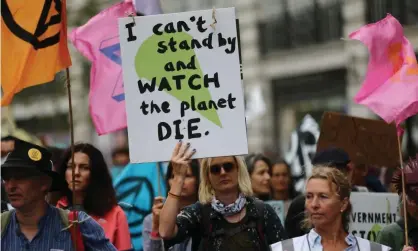  ?? Photograph: Tayfun Salcı/Zuma Press Wire/Rex/ Shuttersto­ck ?? The climate crisis group Extinction Rebellion march through central London, 4 Sep 2021.