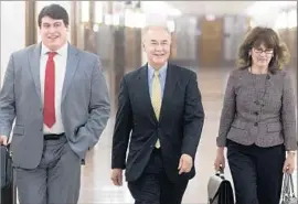  ?? Michael Reynolds European Pressphoto Agency ?? REP. TOM PRICE, center, has fought against government healthcare programs since his time as a state lawmaker in Georgia, where nearly 1 in 5 lack coverage.