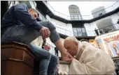  ?? PICTURE: REUTERS/AFRICAN NEWS AGENCY (ANA) ?? Pope Francis kisses the foot of an inmate – one of 12 – at the Regina Coeli prison during the Holy Thursday celebratio­n in Rome, Italy.