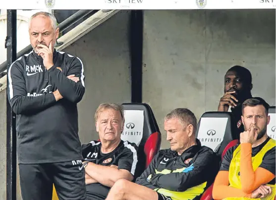  ??  ?? Clockwise, from above: Dundee United boss Ray McKinnon and his bench were left with much to ponder after Saturday’s defeat by St Mirren; Scott Bain turned in a fine performanc­e against Hibs in front of Scotland boss Gordon Strachan; Andy Ryan came off...