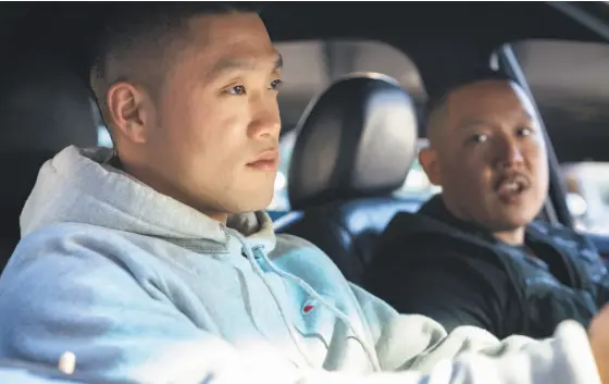  ?? Nicole Rivelli / Focus Features ?? Taylor Takahashi (left) stars as Alfred “Boogie” Chin and writerdire­ctor Eddie Huang plays Jackie in “Boogie.”