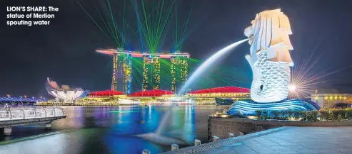  ??  ?? LION’S SHARE: The statue of Merlion spouting water