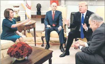  ??  ?? In this file photo shows US vice-president Mike Pence (second left) listens while Pelosi (left), Trump (second right) and Democratic Senate Minority Leader Charles Schumer argue about the impending government shutdown during a meeting at the White House in Washington, DC. — AFP photo