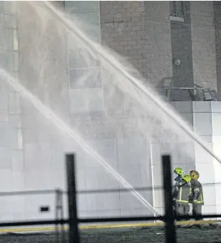  ?? Pictures: Innes Muir/George McLuskie. ?? Top: Flames shoot out of windows shattered by the heat; Above and right: Emergency crews at the scene.