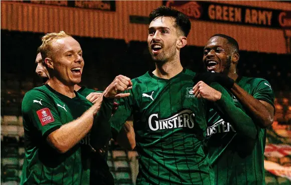  ?? Dave Crawford/PPAUK ?? > Ryan Hardie celebrates his goal for Plymouth Argyle in their 3-0 Emirates FA Cup first round replay win over Sheffield Wednesday