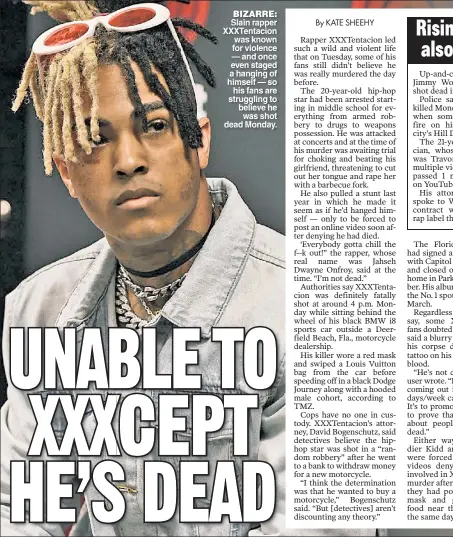  ??  ?? BIZARRE: Slain rapper XXXTentaci­on was known for violence — and once even staged a hanging of himself — so his fans are struggling to believe he was shot dead Monday.