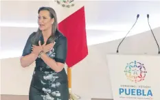  ??  ?? La gobernador­a Martha Érika Alonso dio un mensaje ante la clase política, económica y religiosa de Puebla, en el que se mostró abierta al diálogo.
