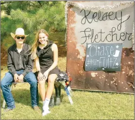  ??  ?? Junior maid Kelsey Fletcher poses with her escort, senior Chase Fultz.