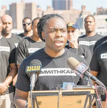  ?? THEODORE PARISIENNE / FOR NEW YORK DAILY NEWS ?? NYPD Sgt. Edwin Raymond at August rally in support of Colin Kaepernick in Brooklyn.