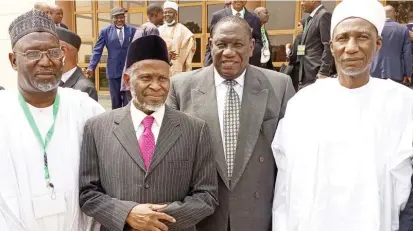  ?? ?? From left: Khadi Sharia Court of Appeal Sokoto State, Dr Umar Jubril; Chief justice of the Federation, Justice Ibrahim Tanko; Administra­tor, National Judicial Institute (NJI), Justice Salisu Abdullahi; Grand Khadi Gombe State Sharia Court, Abdullahi MaiKano during the opening ceremony of the induction course for newly appointed Judges of the Federal and State High Courts, National Industrial Court, Kadis of the Sharia Courts of Appeal and Judges of the Customary Courts of Appeal in Abuja yesterday